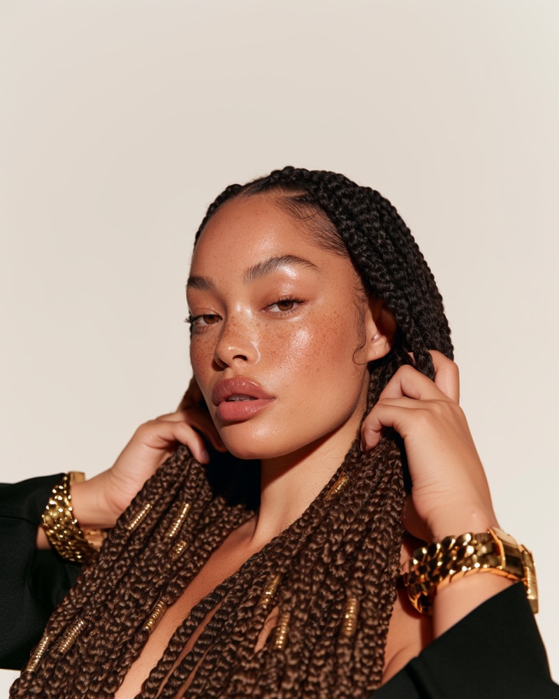 Long knotless braids with gold cuffs