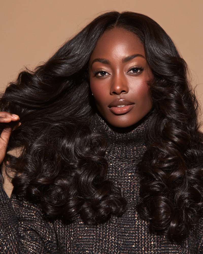 Long layered sew-in with loose curls